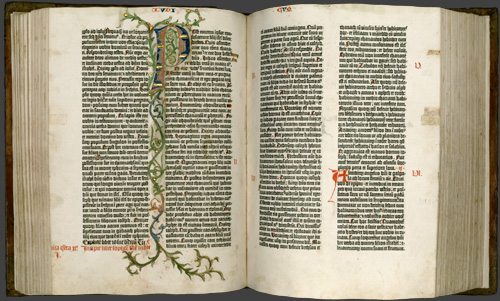 Gutenberg Bible opened to pages 114 verso and 115 recto.